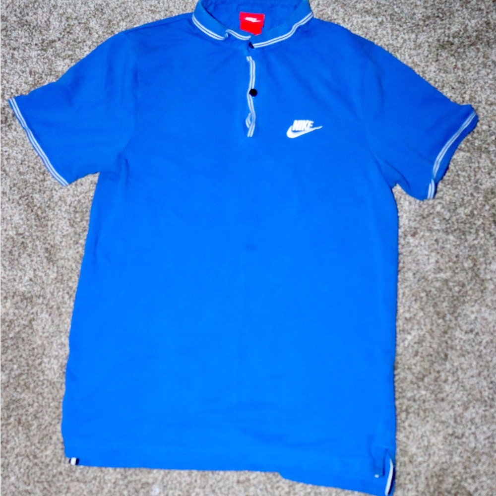 Blue Nike polo shirt